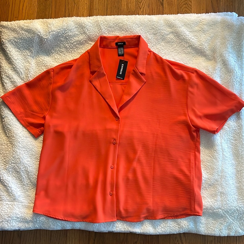 NWT Express Size Small, very soft, runs slightly larger than a small